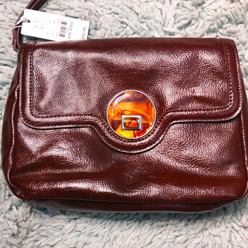 NY & CO maroon leather clutch magnetic closure